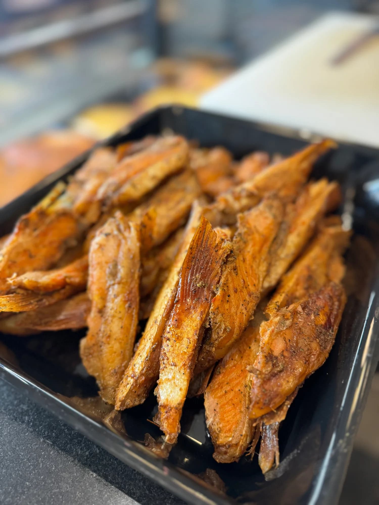 Hot-smoked salmon fins